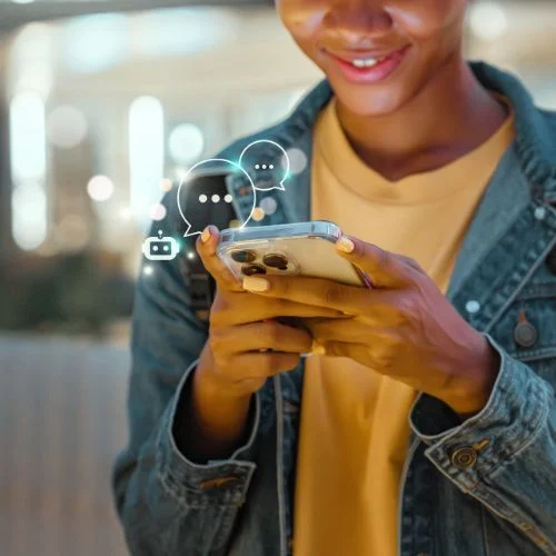 Person using AI chat interface on mobile phone - representing modern AI-powered search behavior